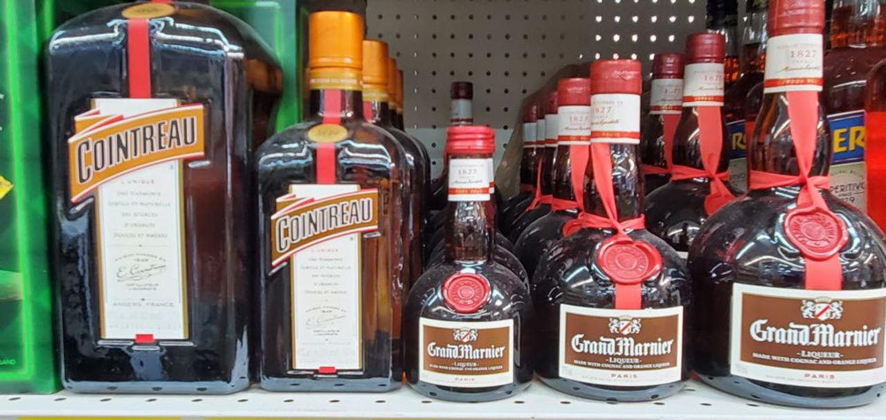 Liquor shelves stocked with premium spirits at Discount Liquor King